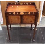 A George III mahogany night commode circa 1770 with pierced gallery.