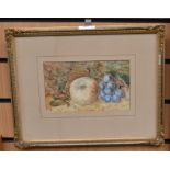 Two framed watercolours of still life, fruit and flowers, both signed by M.