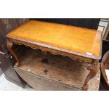 A walnut veneered mid Century coffee table,