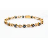 An 18k yellow gold sapphire and diamond bracelet,