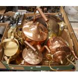 A collection of brass and copper ware to include; three copper kettles,