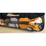 A cased vintage two piece back violin, inlaid mother of pearl,