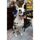 A large floor standing ceramic Great Dane,