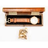 A Smiths 9ct gold cased Dennison wristwatch, Birmingham 1952, tan leather strap,