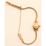 A 9ct gold Longines ladies dress watch, on snake link bracelet, case and clasp stamped 375,
