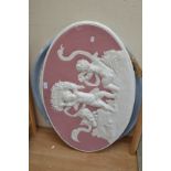 Two Wedgwood style wall plaques depicting cherubs late 19th Century early 20th Century A/F