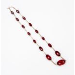 A cherry amber necklace,