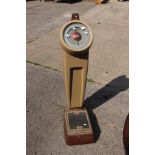 A 1970's Avery Weighing Scales, money insert at top of the scales dial.