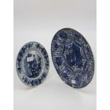 Four assorted blue and white tin glazed earthenware chargers (4)