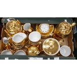 Royal Worcester dinner service, gold, nine cups and saucers, nine side plates, teapot, coffee pot,