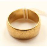 A 9ct gold band 10mm wide, size W, total gross weight approx 10.