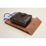 A Louis Vuitton Compact Zippe Wallet - monogrammed canvas, fold over press stud clasp,