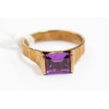 A 9ct gold and synthetic sapphire dress ring, size N½, gross weight approx 3.