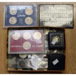 A tin of miscellaneous English and Foreign coins, 1971 proof set, New Zealand Crown set,