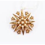 A 15ct gold starburst brooch/pendant set with seed pearls, Chester 1902, gross weight approx 4.