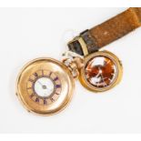 A Dennison gold plated half hunter pocket watch, white enamel dial, Roman numerals,