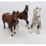 Two Beswick bay stallions with a grey shire horse