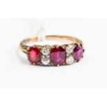 An 18ct gold, ruby and diamond ring, size M½, gross weight approx 3.