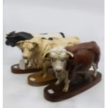 Three Beswick bulls, Hereford, Charolais, Friesian, all from the Connoisseur Collection,