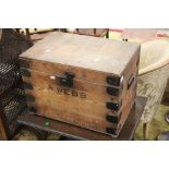 A large metal bound wooden rectangular trunk/box