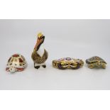 Four Royal Crown Derby paperweights including: Brown Pelican, with 21st anniversary gilt stopper,