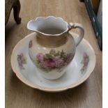 A Victorian matching ceramic wash bowl, jug and vase,