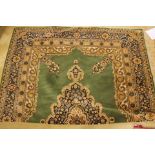 A green Persian rug, 20th Century, machine made,
