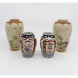 A pair of early 20th Century painted Satsuma vases,