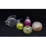 A collection of paperweights to include; five glass paperweights Marcolin Fish,