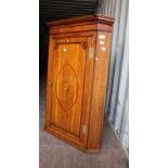 A 19th Century oak and inlay mahogany corner cupboard