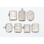 A collection of seven Victorian and later silver vesta cases,