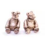 A pair of filled silver bears