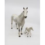 One Beswick large dapple grey horse plus a similar small Royal Doulton horse (2)