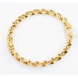 A 9ct gold rope twist bangle, weight approx. 9.8gms.