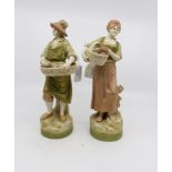 A pair of Royal Dux figurines flower and fruit sellers,