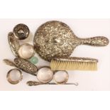 A collection of silver dressing table items; mirror,