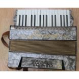 Three piano accordion;