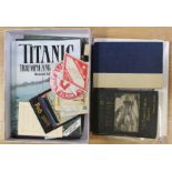 A box of assorted Titanic memorabilia to include books x 3,