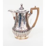 Matthew Boulton: A George III Old Sheffield Plate water jug, circa 1800, footed baluster form,