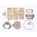 A collection of silver and white and gilt metal including French buckle section,