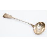 A George IV silver fiddle pattern soup ladle, the handle engraved with a crest, William Eaton,