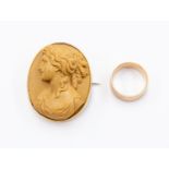 A Victorian Lava cameo oval brooch, carved depicting a bust of a lady, in a yellow metal frame,