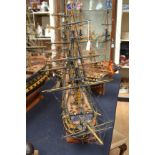 Model of a ship on plinth,