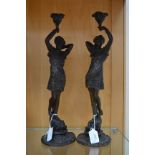 A pair of late 19th Century bronze figural candlesticks, cast in Art Nouveau style,