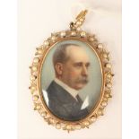An Edwardian locket containing portrait miniature in pearl border
