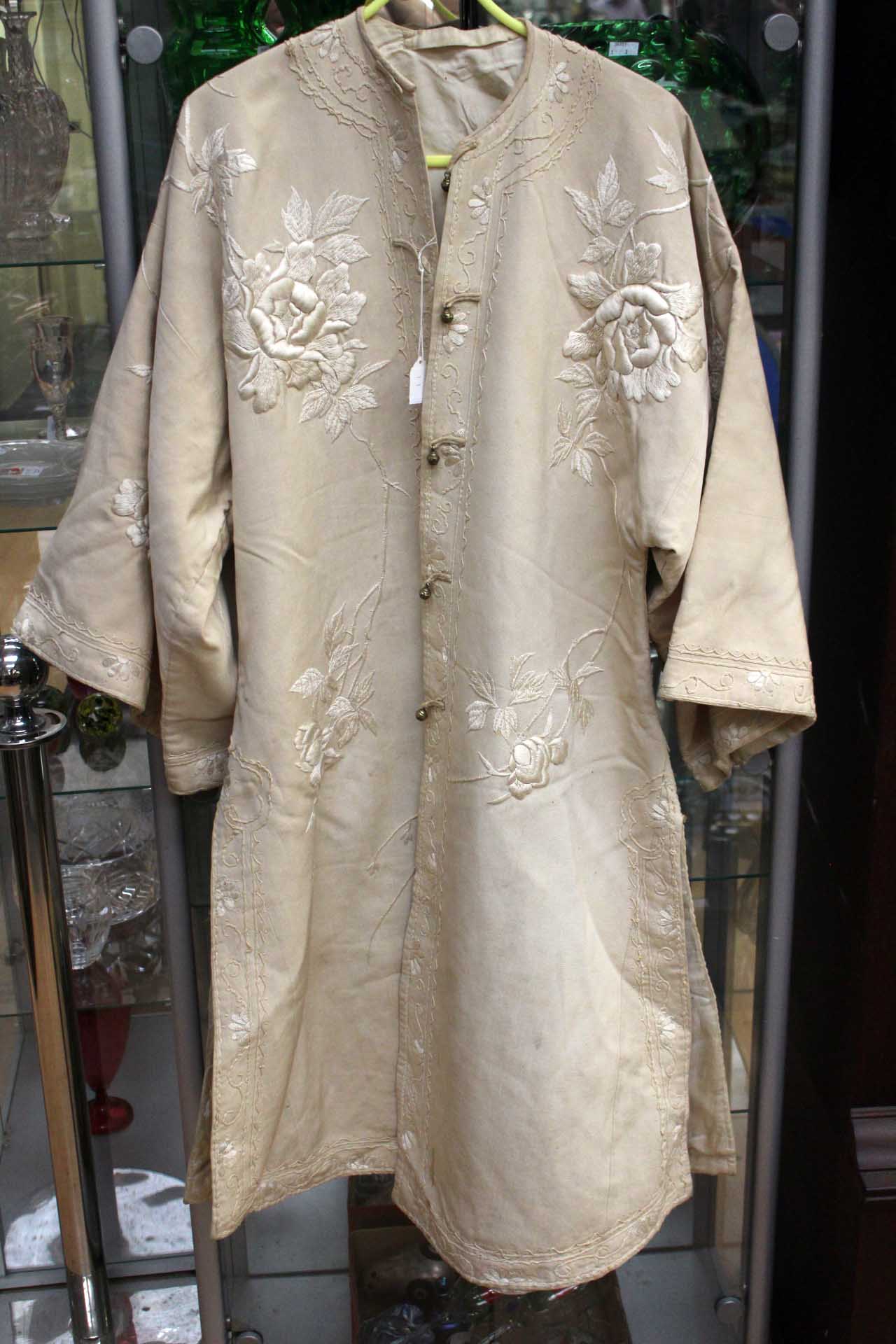 A fine cotton and wool cream Chinese Kimono, 1910-16,