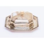 A silver butter dish with lid plus and ivory handle,