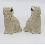 A pair of large 19th Century Staffordshire spaniels (af)