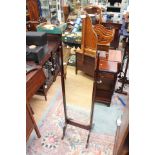 A floor standing bedroom mirror