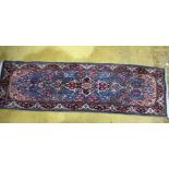 An early 20th Century hall runner, floral design over royal French blue ground, beige,